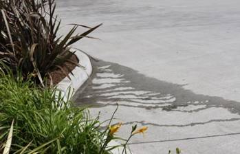 water on sidewalk